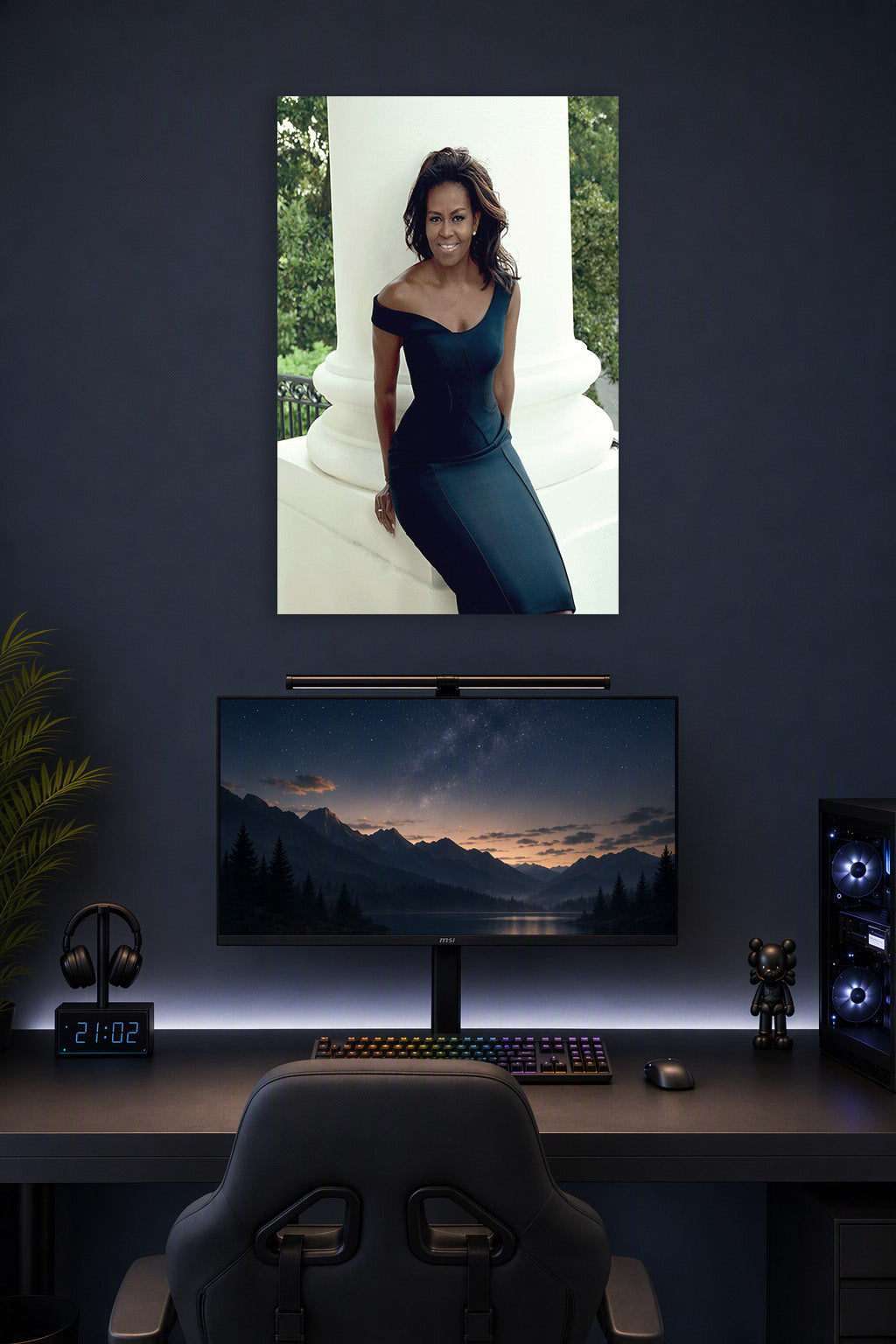 Michelle Obama in a gaming desk setup above a monitor.