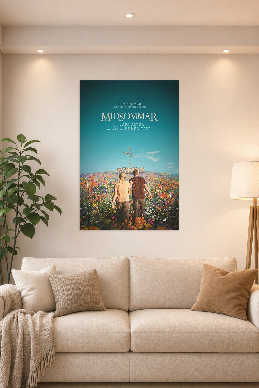 Midsommar in a bright living room above a beige sofa.