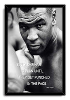 Mike Tyson framed wall art print in black, with a monochrome close-up boxing portrait, raised glove, and motivational quote.