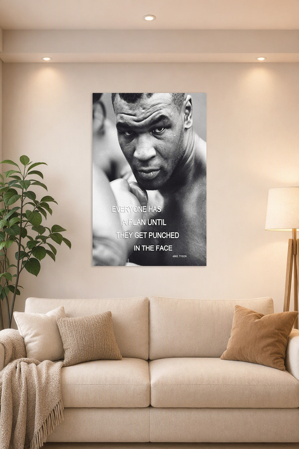 Mike Tyson in a bright living room above a beige sofa.