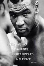Mike Tyson poster featuring a black-and-white close-up of the boxer with his glove raised and a bold motivational quote.