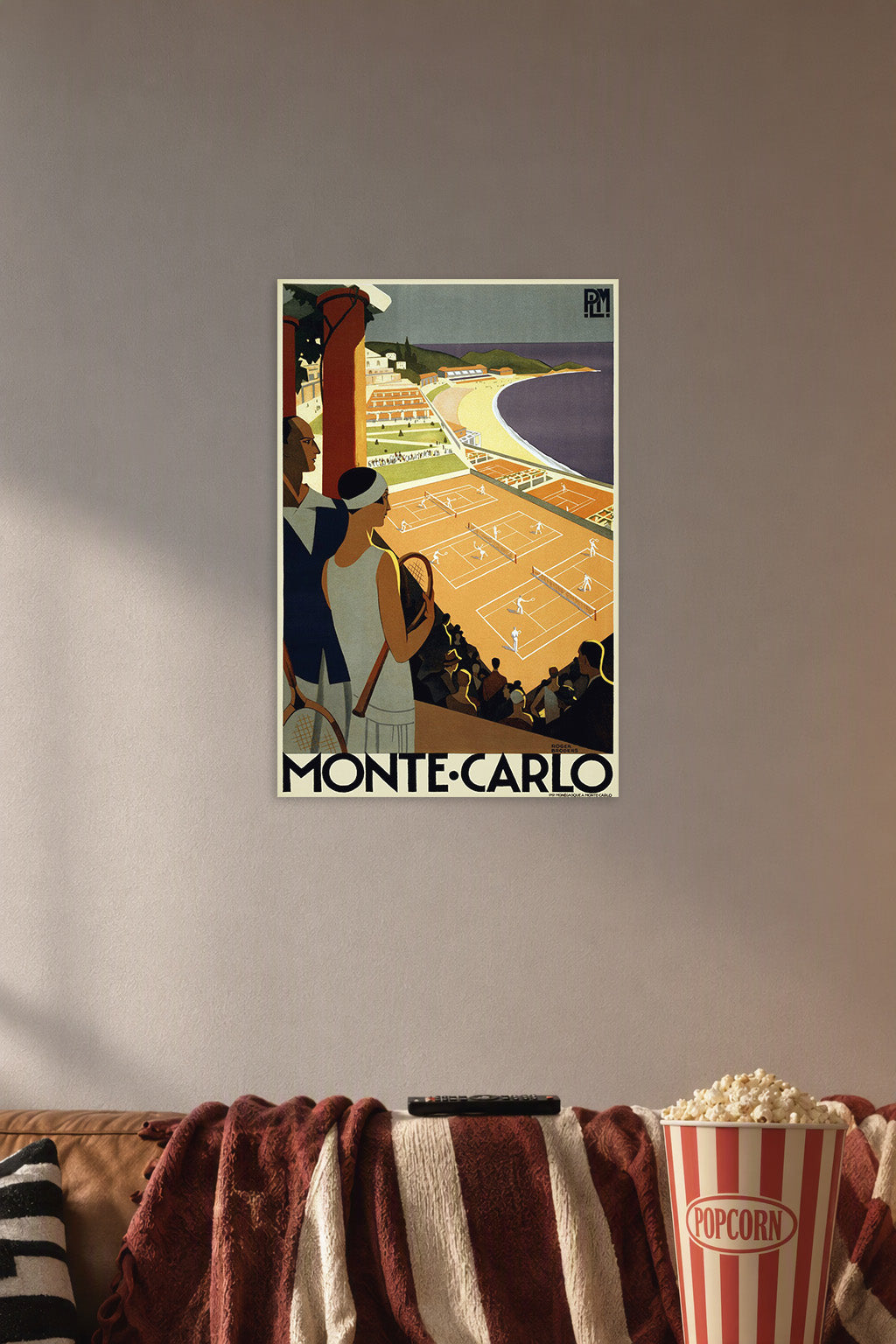 Monte Carlo Tennis Resort View in a cozy movie room above a brown sofa with popcorn.