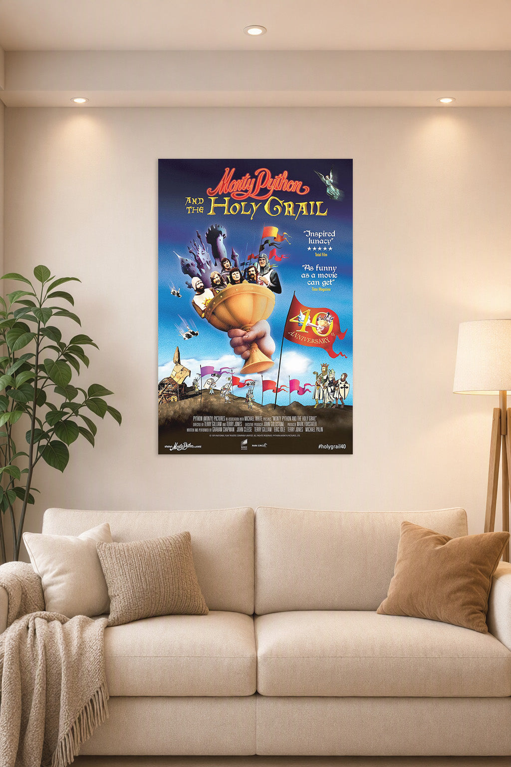 Monty Python and the Holy Grail Movie in a bright living room above a beige sofa.
