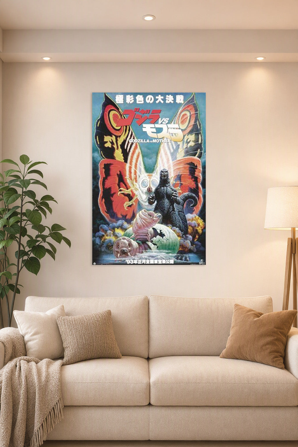 Mothra vs. Godzilla Japanese Movie in a bright living room above a beige sofa.