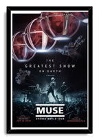 Muse Drones World Tour framed wall art print with musicians onstage, raised crowd hands, red aerial pods, and black frame.