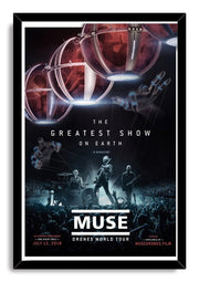 Muse Drones World Tour framed wall art print with musicians onstage, raised crowd hands, red aerial pods, and black frame.