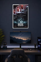 Muse Drones World Tour Concert in a gaming desk setup above a monitor.
