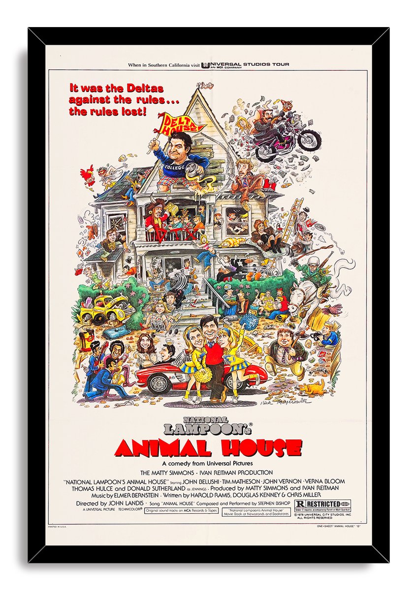 National Lampoon's Animal House framed wall art print with black border, depicting a lively illustrated fraternity house and bold red lettering.