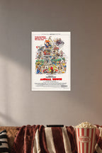 National Lampoon's Animal House Movie Poster in a cozy movie room above a brown sofa with popcorn.