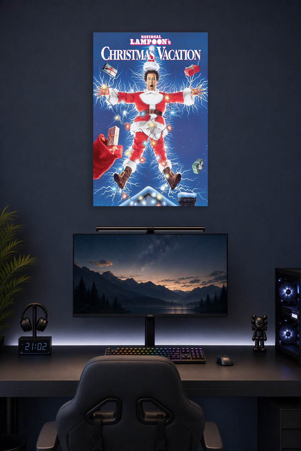 National Lampoon's Christmas Vacation in a gaming desk setup above a monitor.