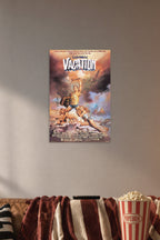 National Lampoon's Vacation Movie Poster in a cozy movie room above a brown sofa with popcorn.