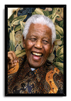 Nelson Mandela framed wall art print presents his smiling portrait in a black frame against a white background.