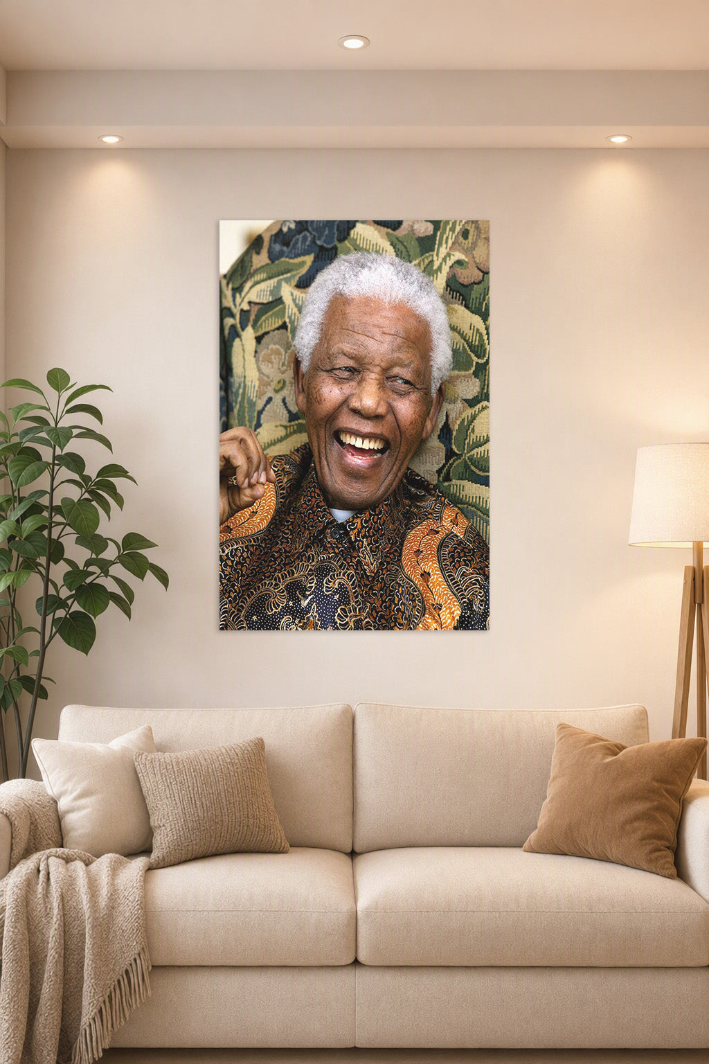 Nelson Mandela in a bright living room above a beige sofa.