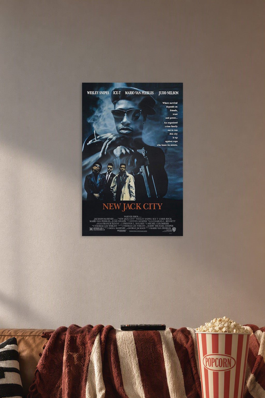 New Jack City 1991 Movie Poster in a cozy movie room above a brown sofa with popcorn.