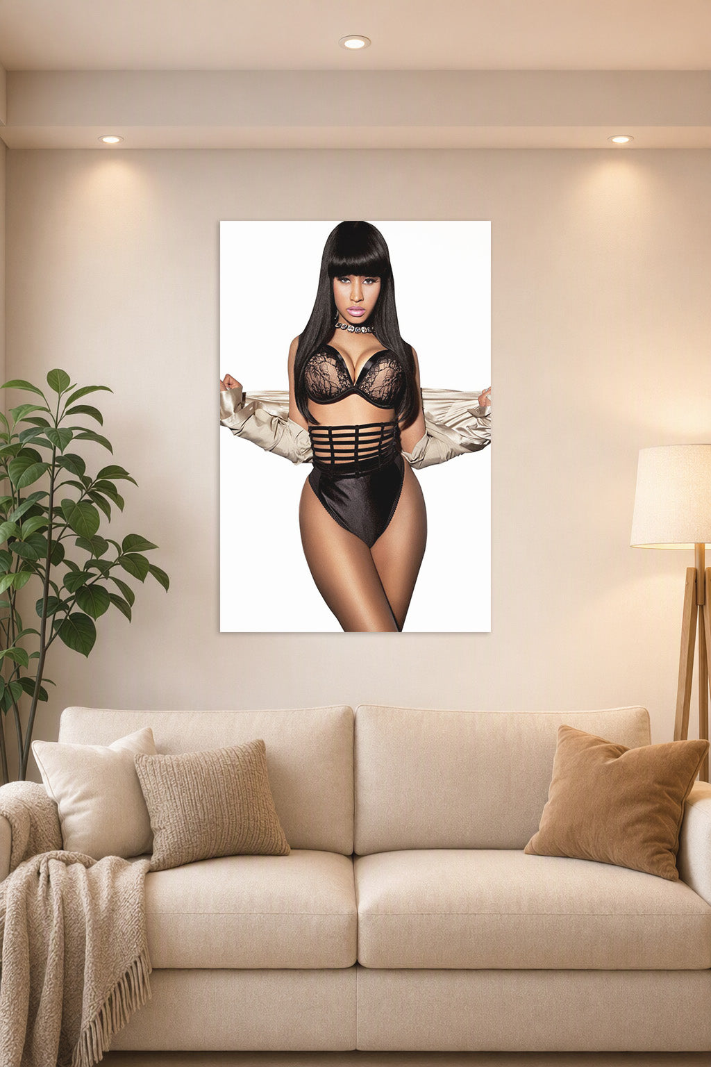 Nicki Minaj in a bright living room above a beige sofa.