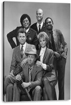 Night Court canvas wall art print presents a monochrome ensemble portrait of six cast members, including a seated man in a hat holding a gavel.