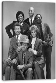 Night Court canvas wall art print presents a monochrome ensemble portrait of six cast members, including a seated man in a hat holding a gavel.