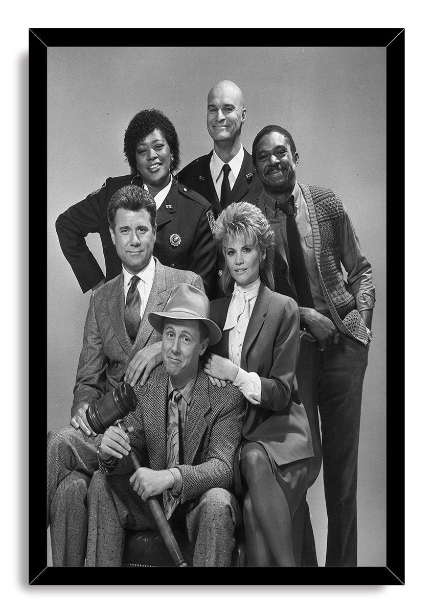 Night Court framed wall art print displays a black-and-white group portrait of six cast members, set within a sleek black mitered frame.