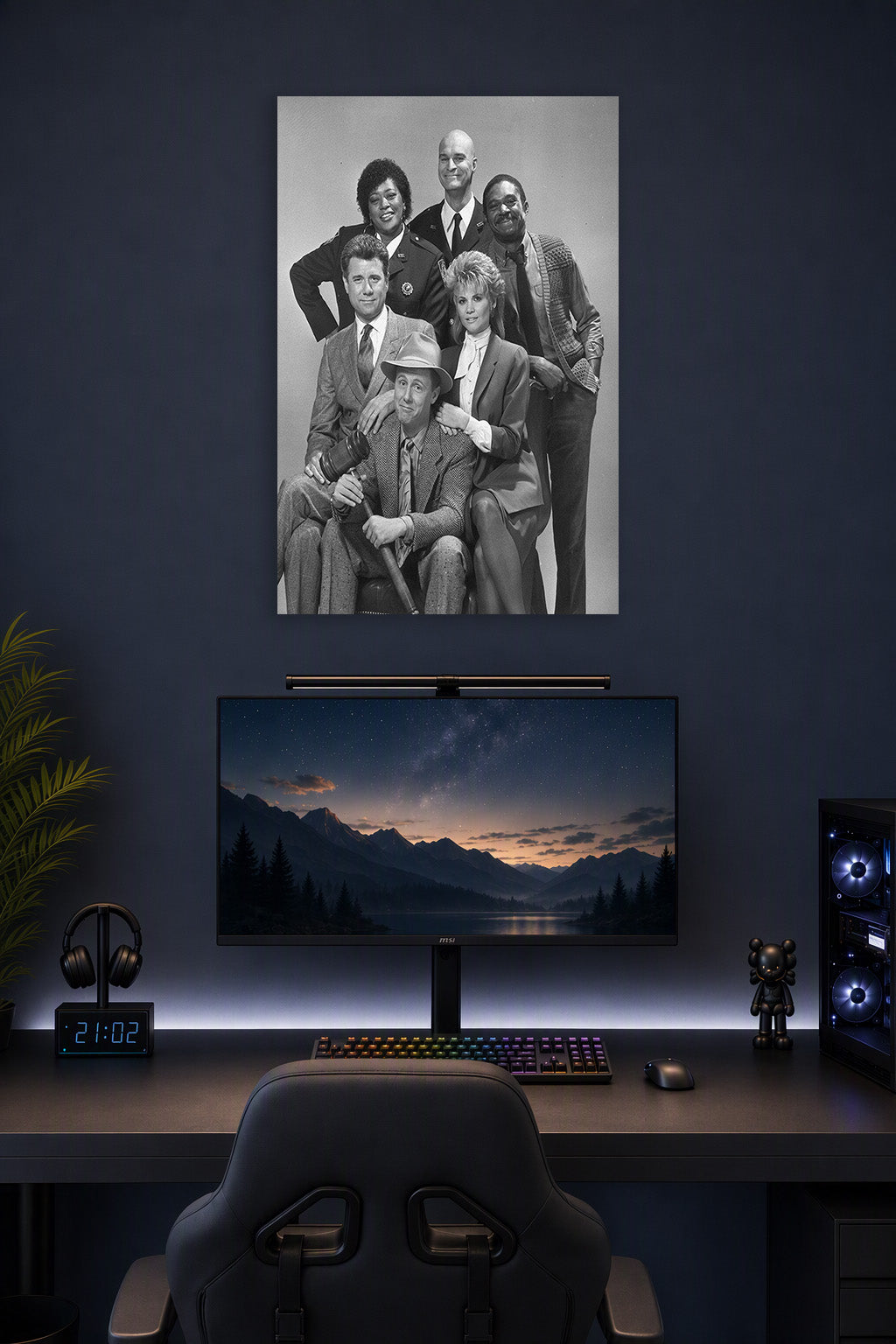 Night Court TV Show Cast in a gaming desk setup above a monitor.