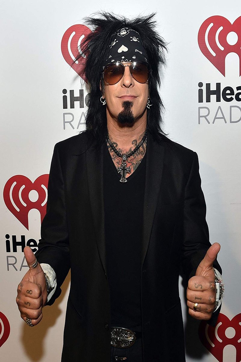 Nikki Sixx poster features the rock musician in a black bandana and sunglasses giving two thumbs up before iHeartRadio logos.