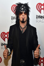 Nikki Sixx poster features the rock musician in a black bandana and sunglasses giving two thumbs up before iHeartRadio logos.