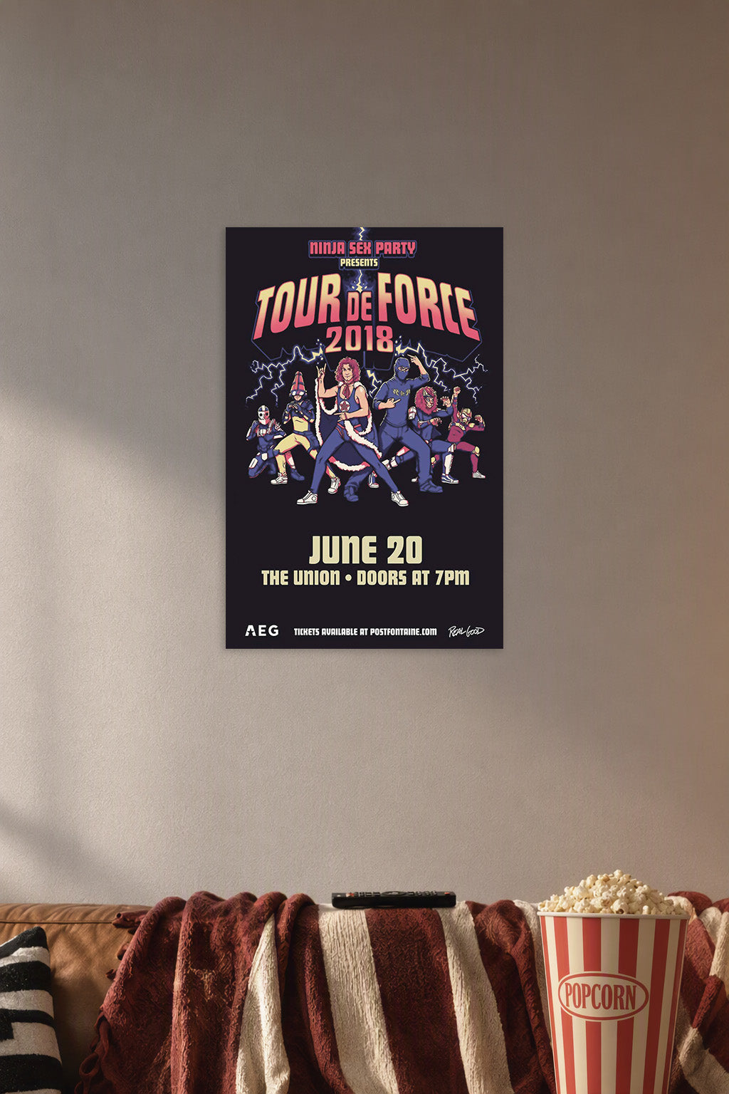Ninja Sex Party Tour de Force 2018 Concert in a cozy movie room above a brown sofa with popcorn.