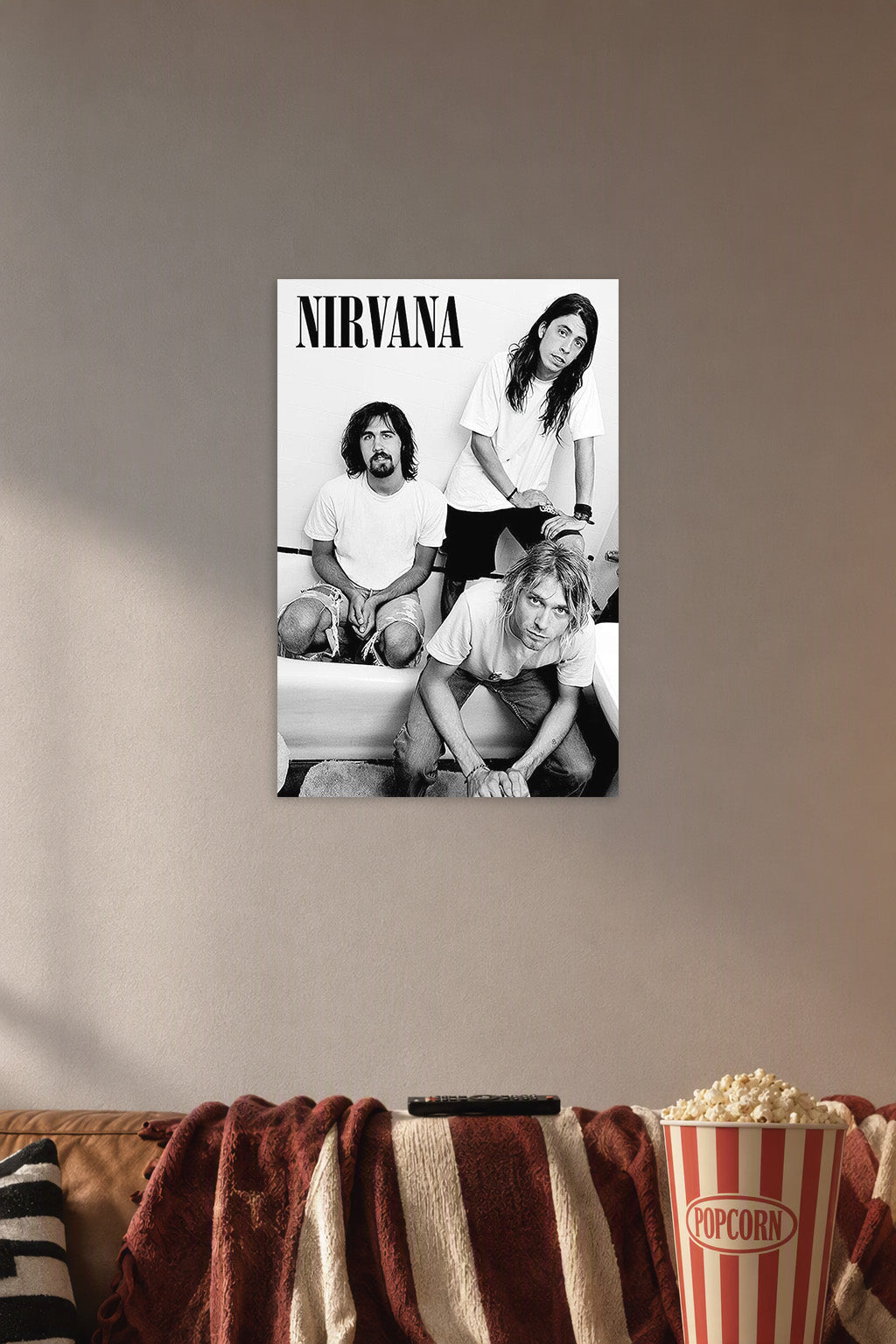 Nirvana (B&W - Kurt, Krist & Dave) Music in a cozy movie room above a brown sofa with popcorn.