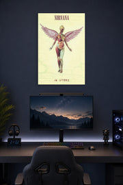 Nirvana In Utero - Album Cover Music in a gaming desk setup above a monitor.