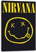 Nirvana canvas wall art print displays yellow logo text and the iconic X-eyed smiley with tongue against a black background.