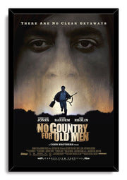 No Country for Old Men framed wall art print presents a man carrying a rifle beneath giant eyes in muted gold, gray, and black.