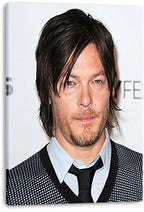 Norman Reedus canvas wall art print featuring a close-up event portrait in a light shirt, black tie, and patterned jacket.