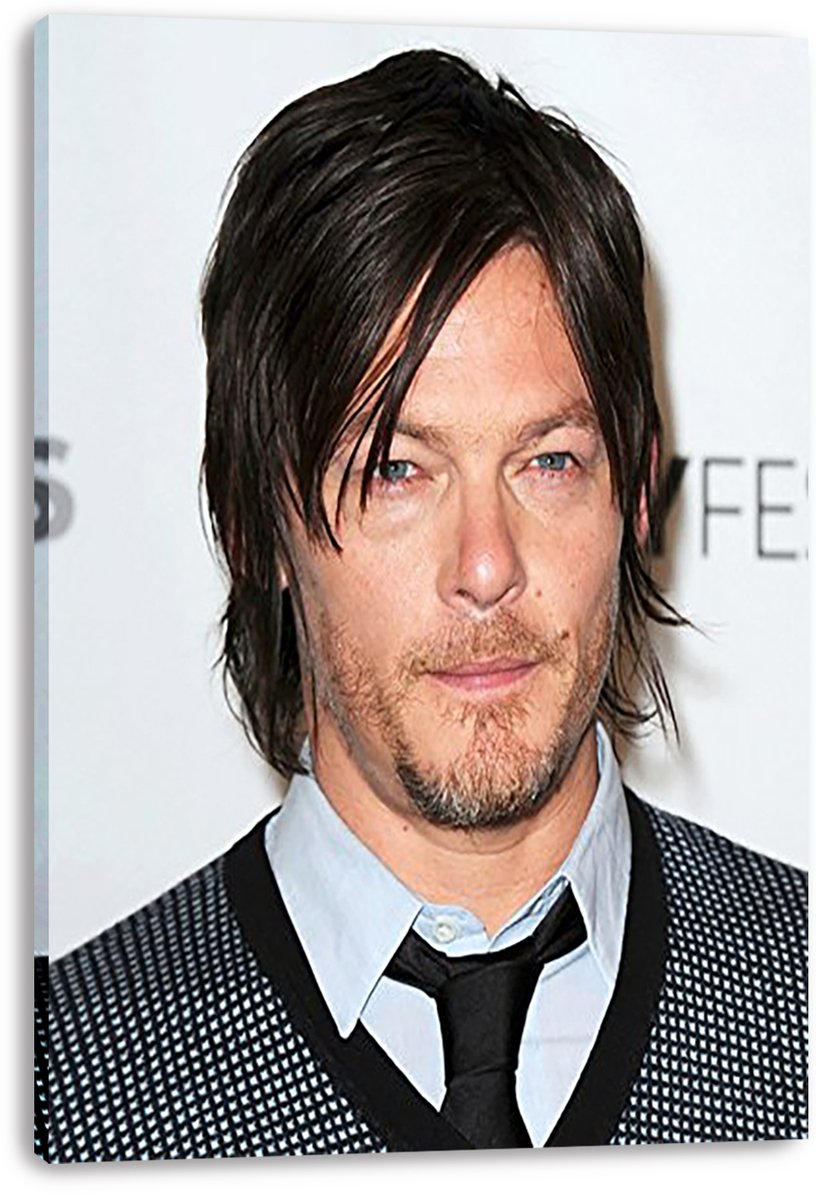 Norman Reedus canvas wall art print featuring a close-up event portrait in a light shirt, black tie, and patterned jacket.