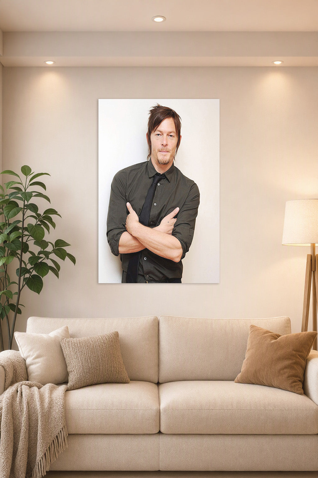 Norman Reedus in a bright living room above a beige sofa.