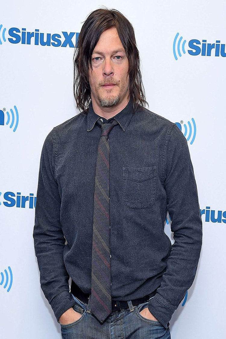 Norman Reedus poster features a full-length portrait in a dark blue shirt and striped tie before a SiriusXM backdrop.