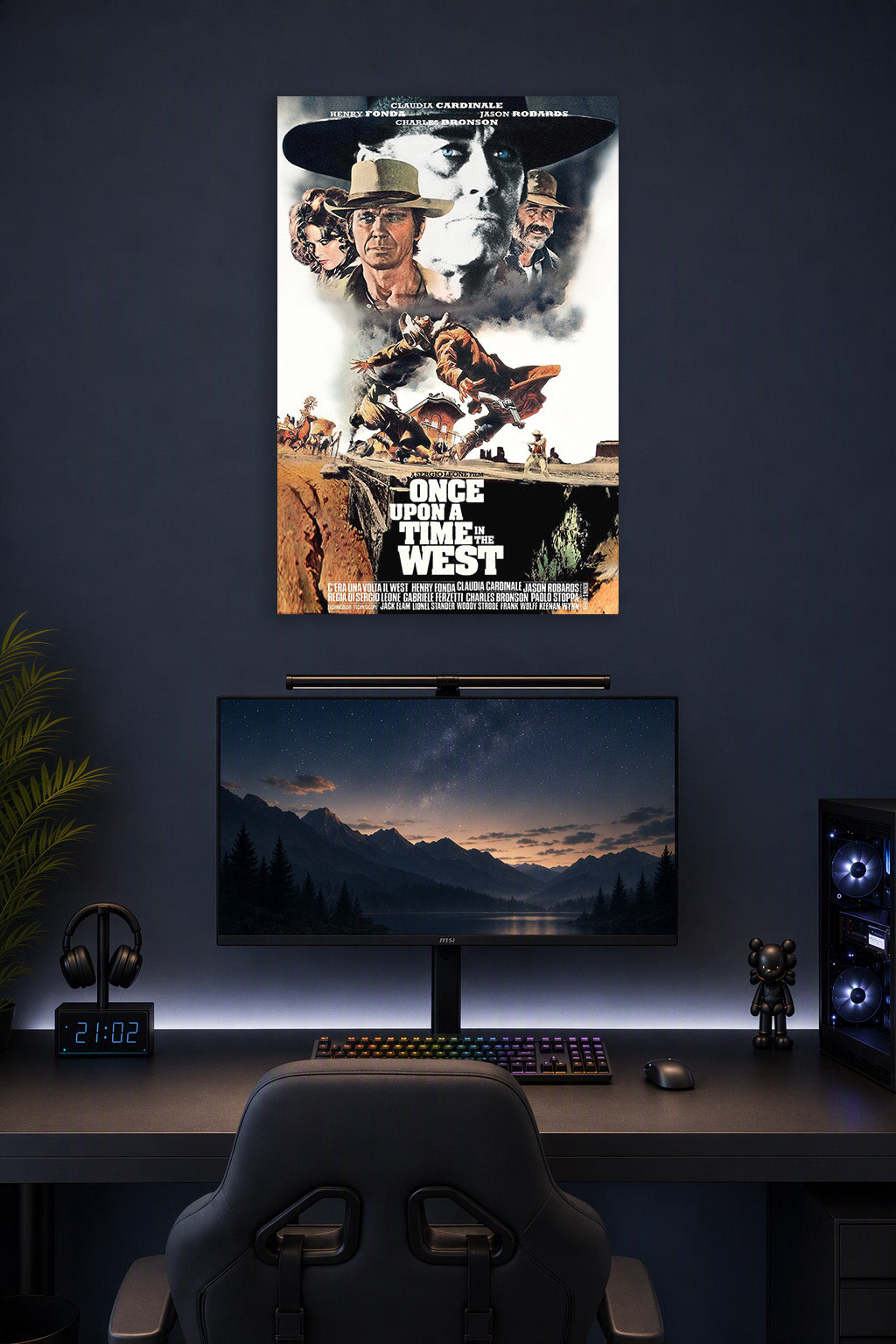 Once Upon a Time in the West Movie Poster in a gaming desk setup above a monitor.