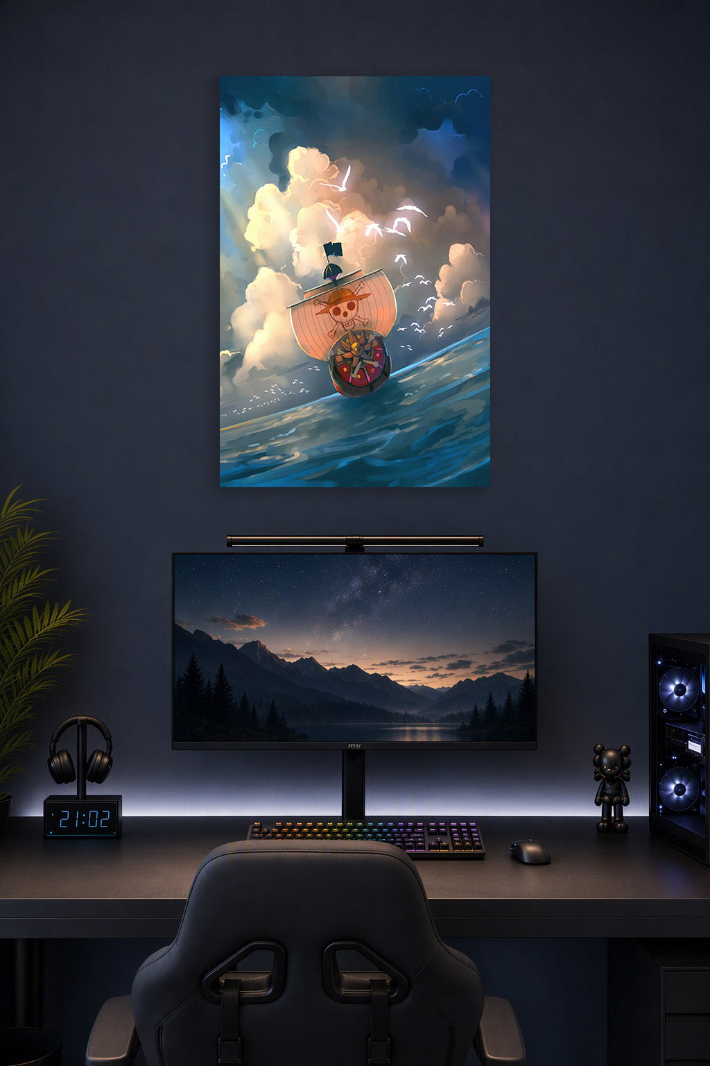 One Piece Thousand Sunny Ship in a gaming desk setup above a monitor.