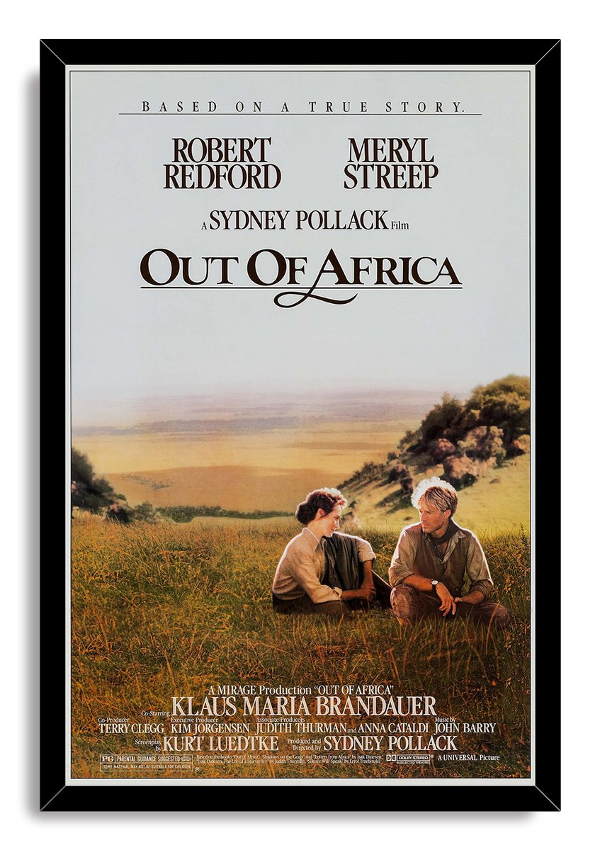 Out of Africa framed wall art print in a black frame, featuring the two stars seated amid golden grass and rolling hills.