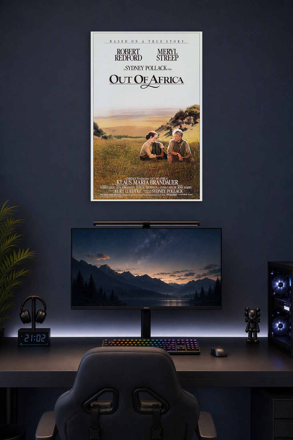 Out Of Africa Robert Redford Meryl Streep in a gaming desk setup above a monitor.