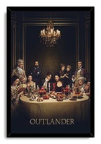 Outlander framed wall art print presents the cast at a lavish candlelit dinner, bordered by a sleek black frame.