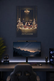Outlander Cast Dinner Scene in a gaming desk setup above a monitor.