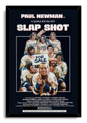 Slap Shot framed wall art print features Paul Newman gripping a hockey stick before his colorful, battered Chiefs teammates.