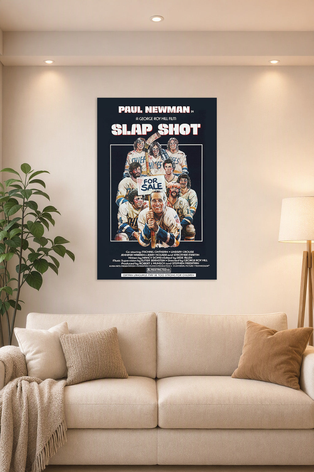 Paul Newman Slap Shot Movie in a bright living room above a beige sofa.