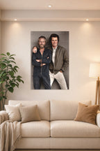 Paul Newman and Clint Eastwood in a bright living room above a beige sofa.
