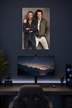 Paul Newman and Clint Eastwood in a gaming desk setup above a monitor.