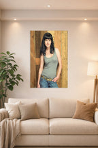 Pauley Perrette in a bright living room above a beige sofa.