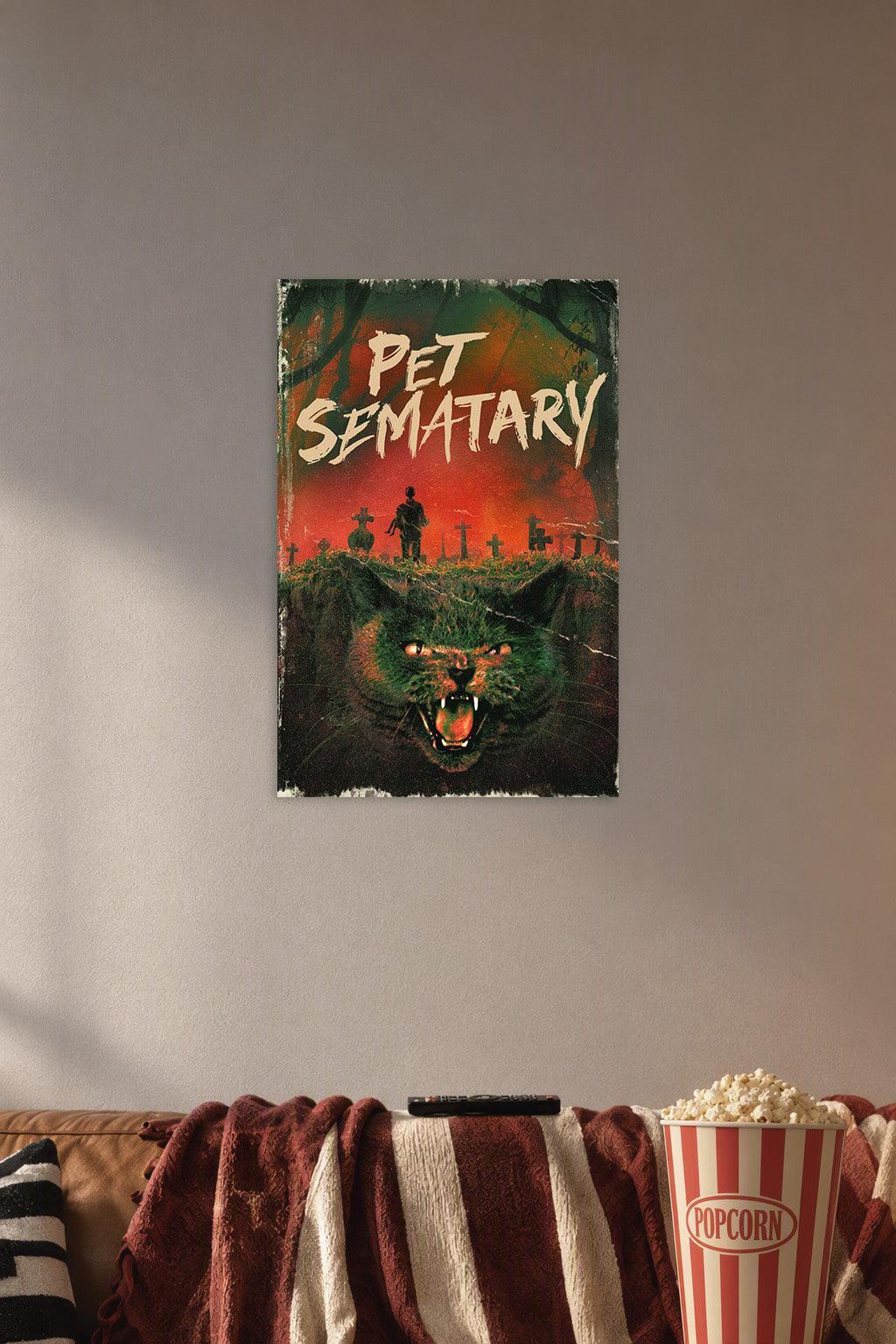 Pet Sematary Horror Film in a cozy movie room above a brown sofa with popcorn.