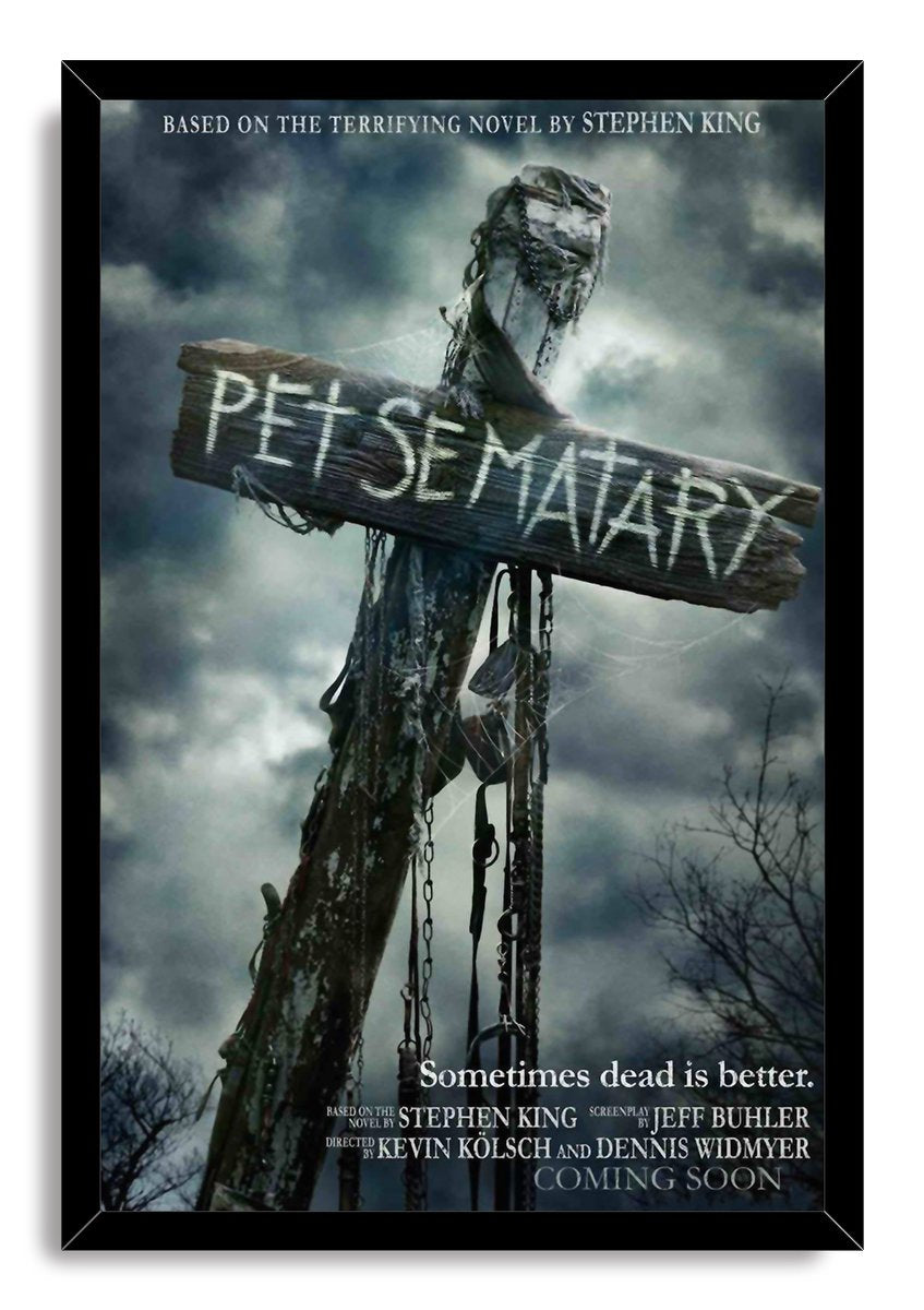 Pet Sematary framed wall art print with a black border, weathered sign, dangling chains, and storm clouds.