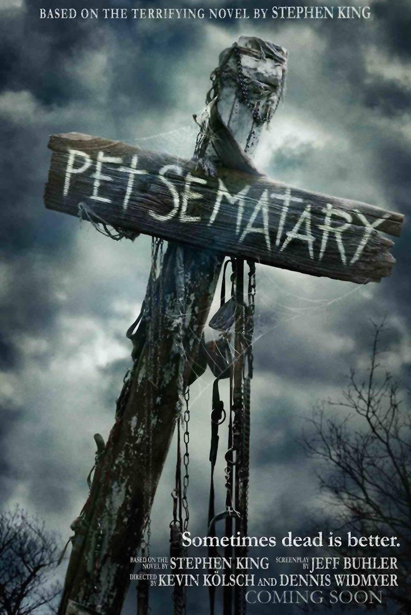 Pet Sematary movie poster wall art featuring a weathered sign on a chained wooden cross beneath stormy gray clouds.