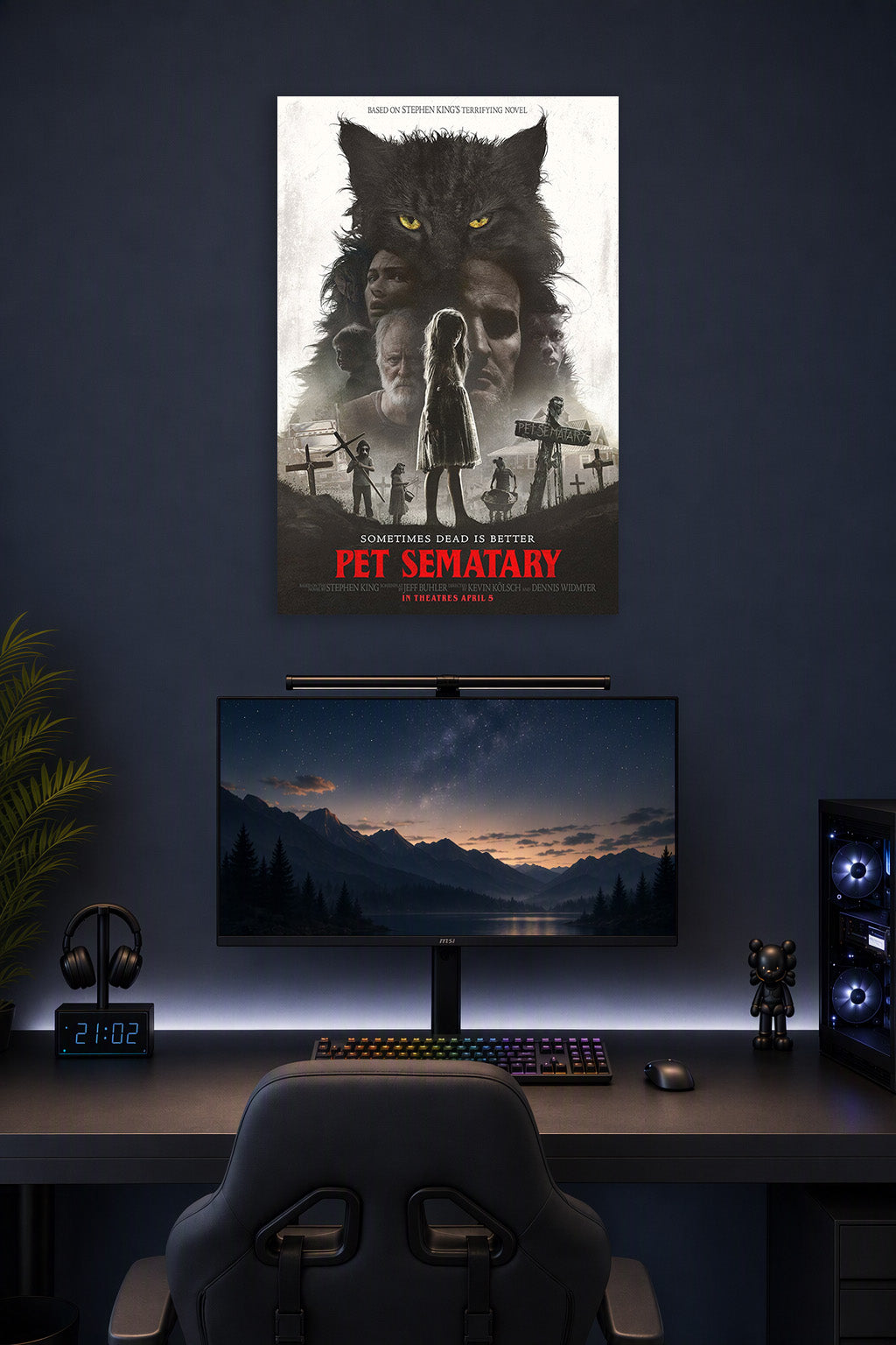 Pet Sematary Movie Poster in a gaming desk setup above a monitor.