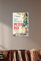 Peter Pan Disney in a cozy movie room above a brown sofa with popcorn.